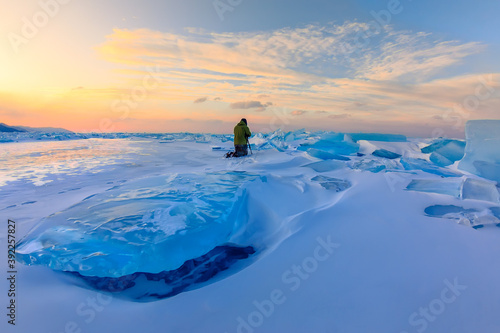 photographer takes pictures hummok ice lake baikal, russia