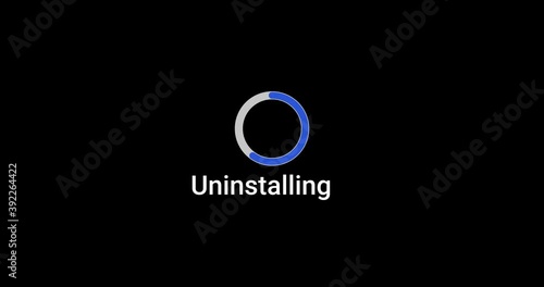 Uninstallation progress bar computer screen animation loop isolated on black background with blue progress install screen indicator in 4K. Computer loading screen game uninstall photo