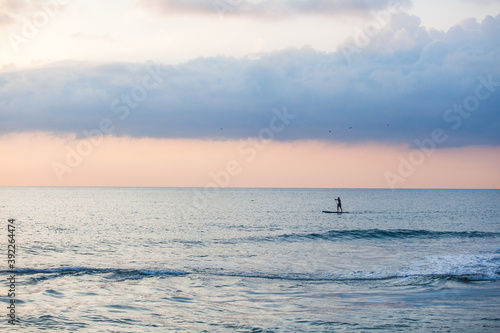 Sapboarder floats on the sea in Sochi, Russia