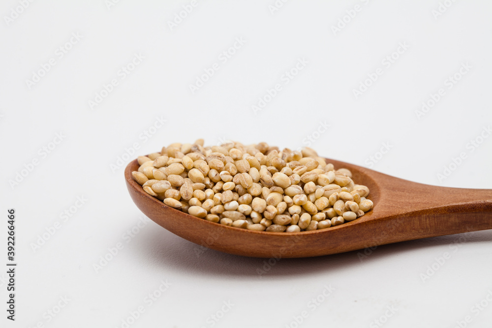 Wooden spoon with brown rice unpolished rice Wooden spoon with brown rice unpolished rice
