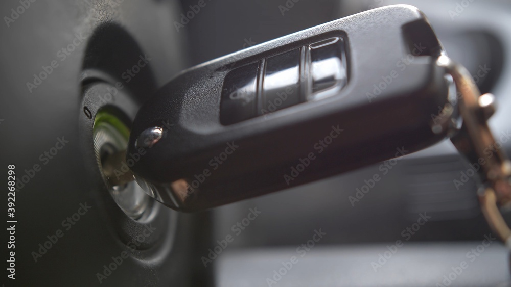 Starting and Stopping Car Engine with Ignition Key Close Up