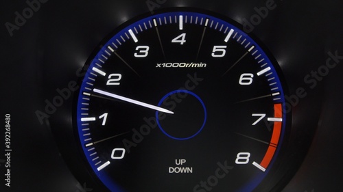Tachometer Gauge of Starting and Stopping Car Close Up