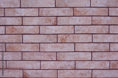 dull brick red masonry wall background 