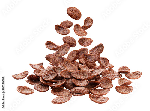 Falling chocolate corn flakes isolated on white background