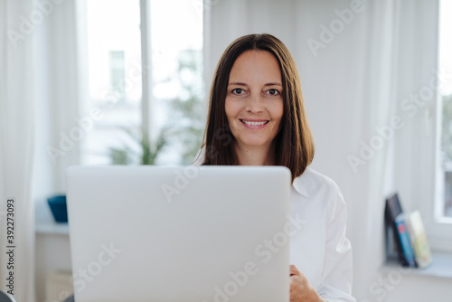 Happy smiling motivated businesswoman