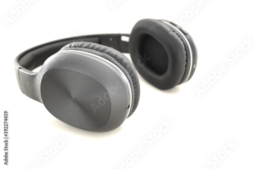 Close up with selective focus of gray headphone in a white background