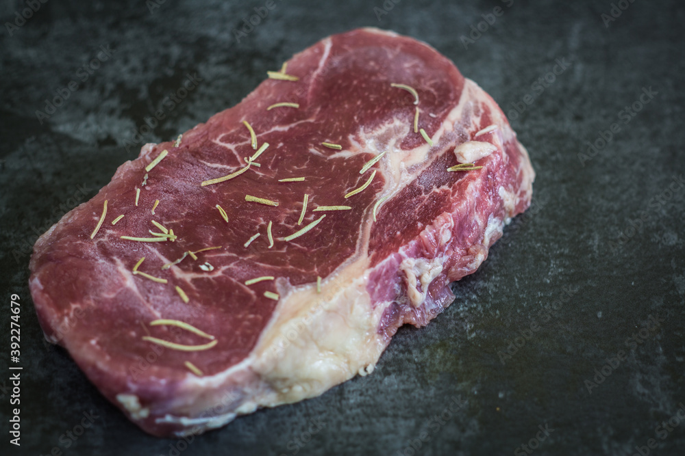 Fresh beef steak sliced on a background