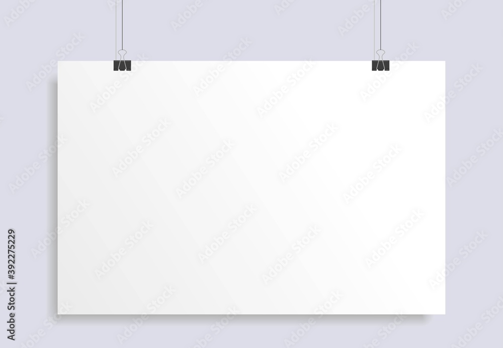 Blank white paper hanging on two office clip. Mock up template for your design. Horizontal empty sheet. Show your flyers, brochures, headlines. Blank white paper hanging on two office clip. Mock up template for your design. Horizontal empty sheet. Show your flyers, brochures, headlines.