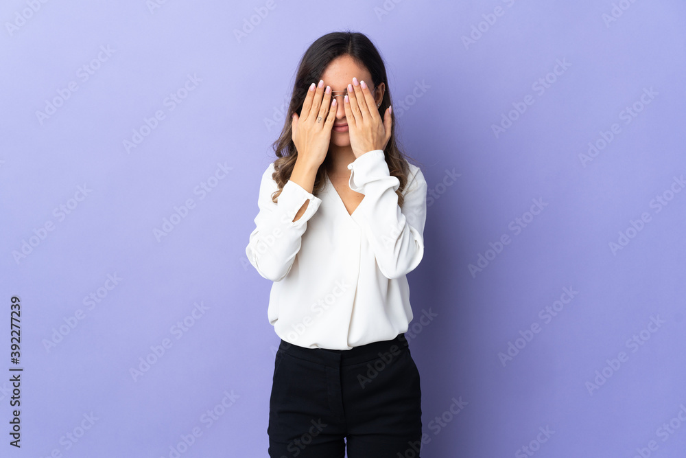 Young caucasian woman isolated on purple background covering eyes by hands Young caucasian woman isolated on purple background covering eyes by hands