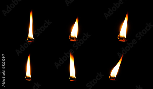 The lights on the candles are on the black background.