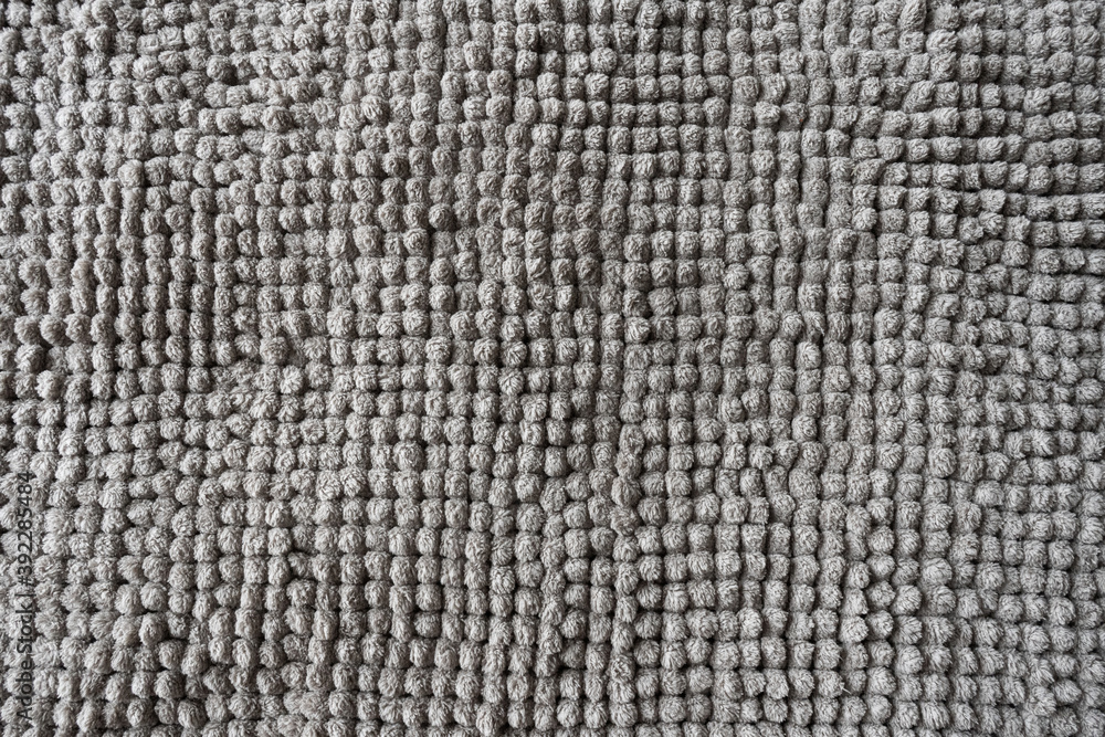 Texture of a gray blanket made of small balls. Texture of a gray blanket made of small balls.