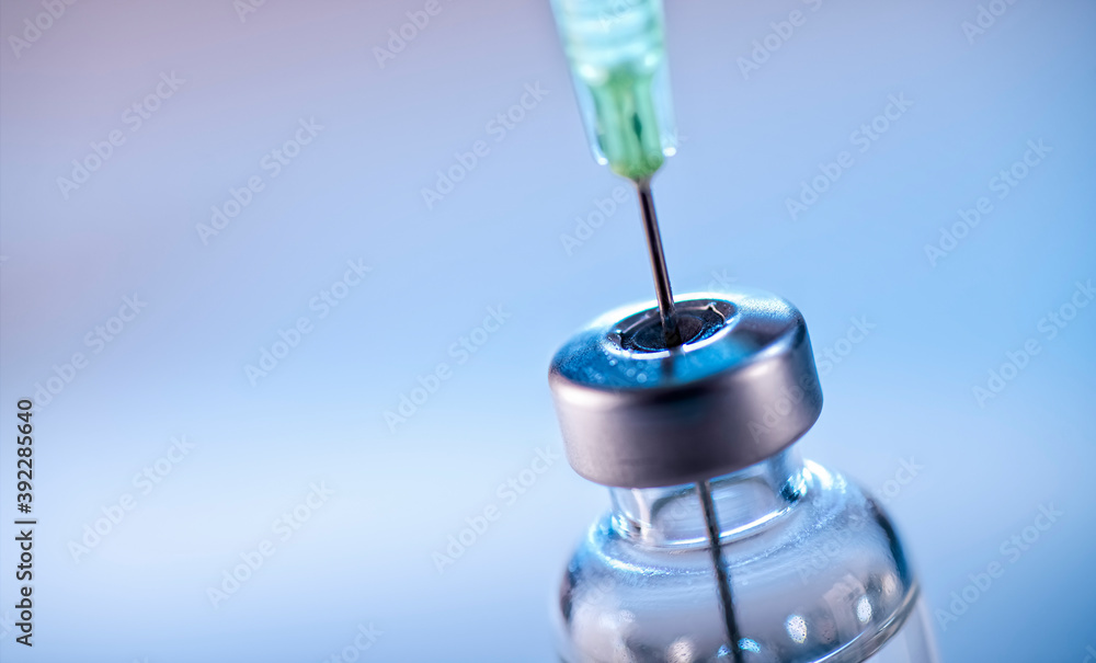 Vaccine and syringe Vaccine and syringe