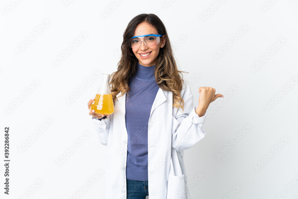Young scientific woman isolated on white background pointing to the side to present a product Young scientific woman isolated on white background pointing to the side to present a product