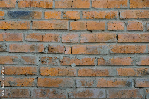 Orange brick wall. Copy space.