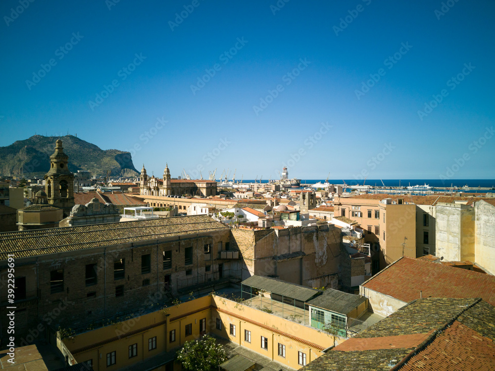 Obraz premium Urban landscape of Palermo the main city of Sicily in Italy. Here the roof and of the old houses with the mountains in the background seen from the St. Catherine's Monastery terraces