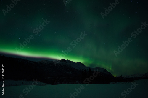 Aurora over Alaska mountains © KBDESIGNPHOTO