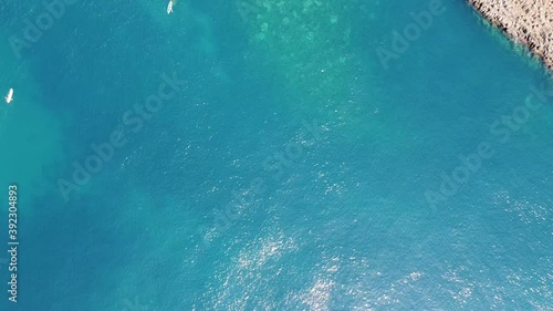 Aerial shooting with drone of the sea in the Acitrezza area on the Ionian coast in Sicily