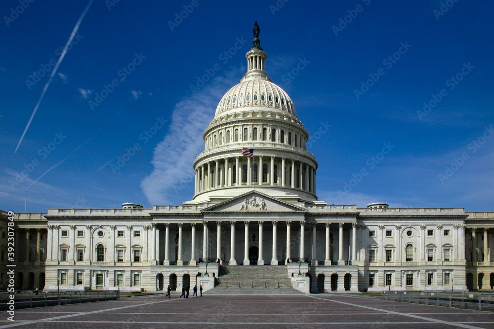 Capitol Hill in Washington DC with dome and colonnade with daylight and facade details