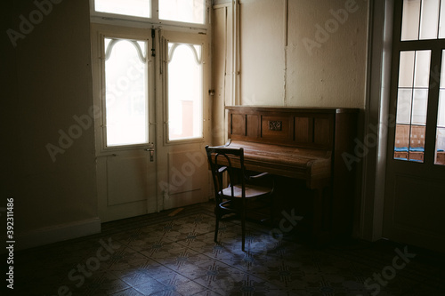 Wallpaper Mural Living room of abandoned house with chair and piano Torontodigital.ca