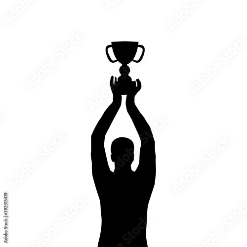 Man silhouette holding a championship trophy