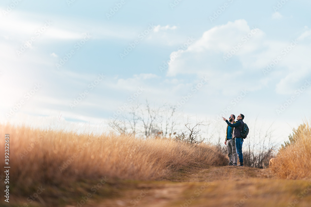 Tourists enjoy watching the beautiful countryside.