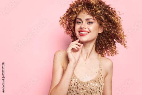 Woman portrait Smiling red lips curly hair model fashion clothes 