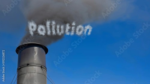 Black smokestack with thick black polluting smoke coming from it against a clear blue sky