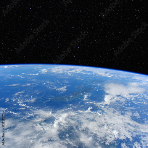 Blue Earth under the starry night sky. Elements of this image furnished by NASA.
