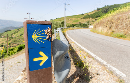 way of Saint James signpost on a country road next to Mesao Frio town, Vila Real district, Douro, Portugal photo