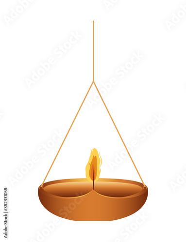 candle on a chandelier whit orange flame