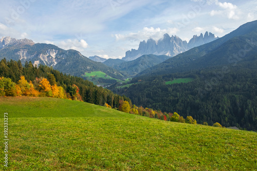 Typical beautiful landscape in the Dolomites, Val di Funes valley in the background with the Odle mountains