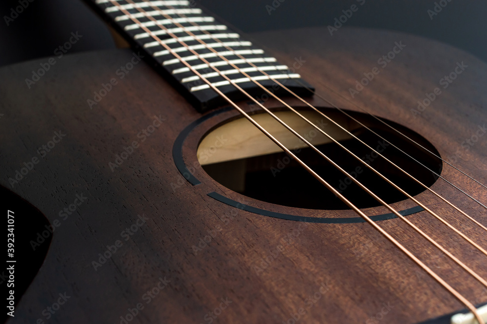 Fototapeta premium Wooden classical acoustic guitar. Close up.