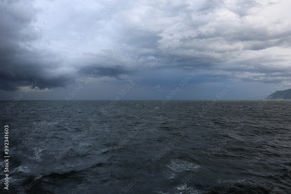 storm clouds over the sea storm clouds over the sea