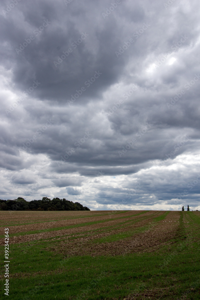 Dark skies over fields in Hertfordshire near Sawbridgeworth, England