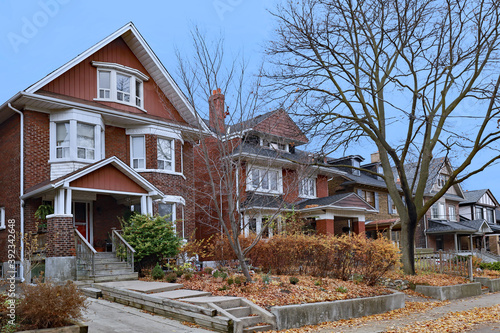 Photography Street of large older detached brick houses with gables