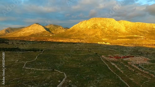 Aerial view of the austere landscape of Mani, Greece, at dusk