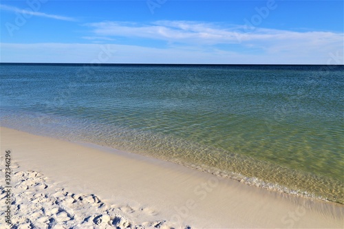 Sand, ocean, sky, tranquility and relaxation, photo taken on the beach of Santa Rose Island, Gulf of Mexico