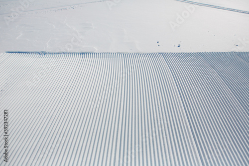 pattern of groomed snow in ski area