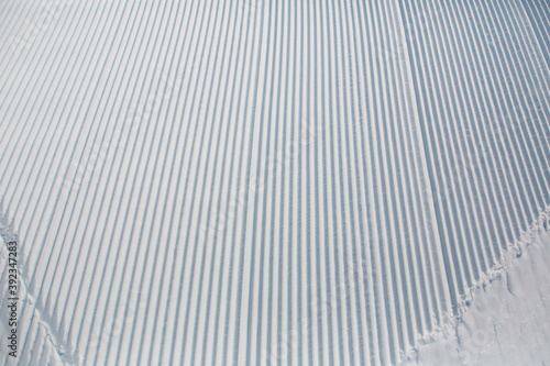 pattern of groomed snow in ski area