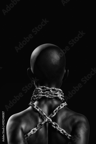 Female afro american slave with heavy chain around her neck photo