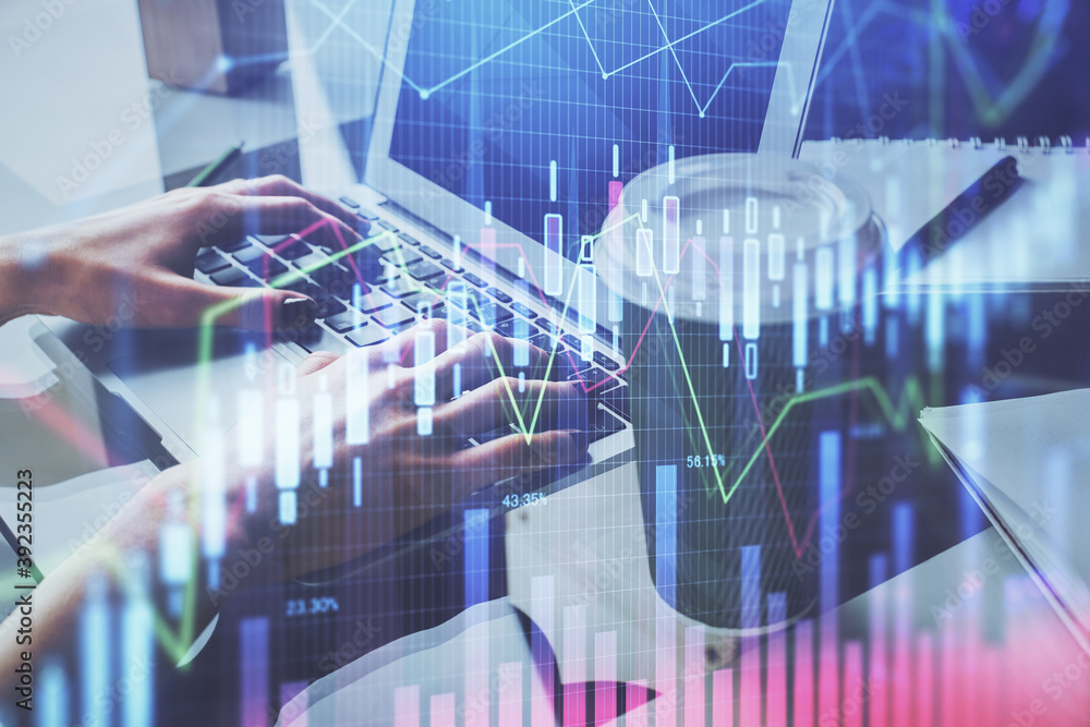 Double exposure of woman hands typing on computer and forex chart hologram drawing. Stock market invest concept. Double exposure of woman hands typing on computer and forex chart hologram drawing. Stock market invest concept.