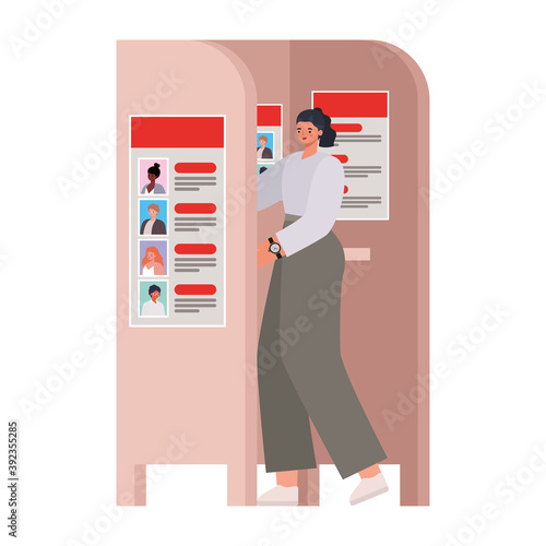 woman voting with black hair and ponytale in voting booth