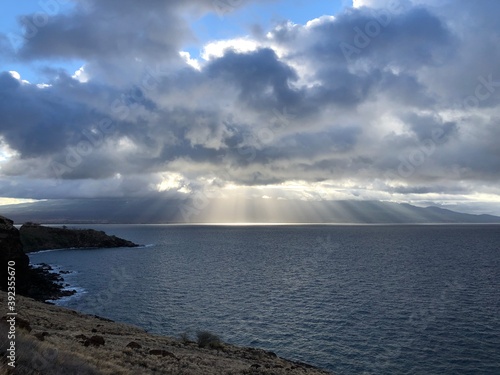 Sun reys over the ocean in Maui