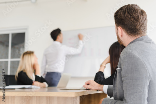 Wallpaper Mural Business people brainstorming ideas for solving problems in company meeting rooms, the company staff meeting. Torontodigital.ca