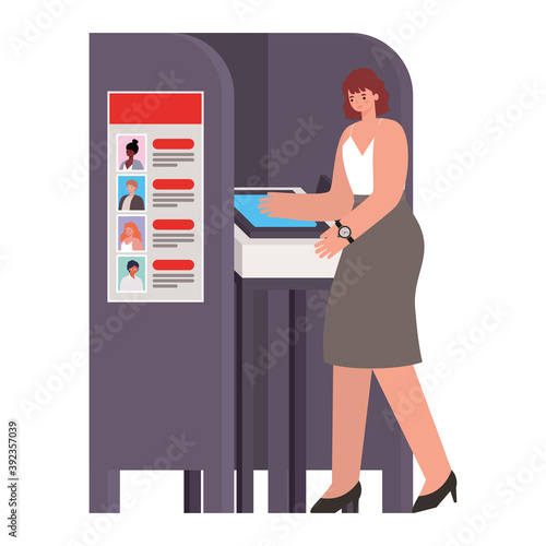 woman voting with reddish hair and white shirt in gray voting booth