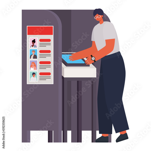 man voting with black hair and glasses in gray voting booth