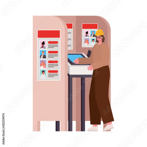 woman with brown hair and safety helmet in voting booth