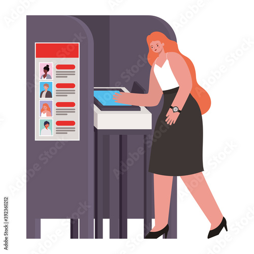 woman voting with long orange hair in gray voting booth