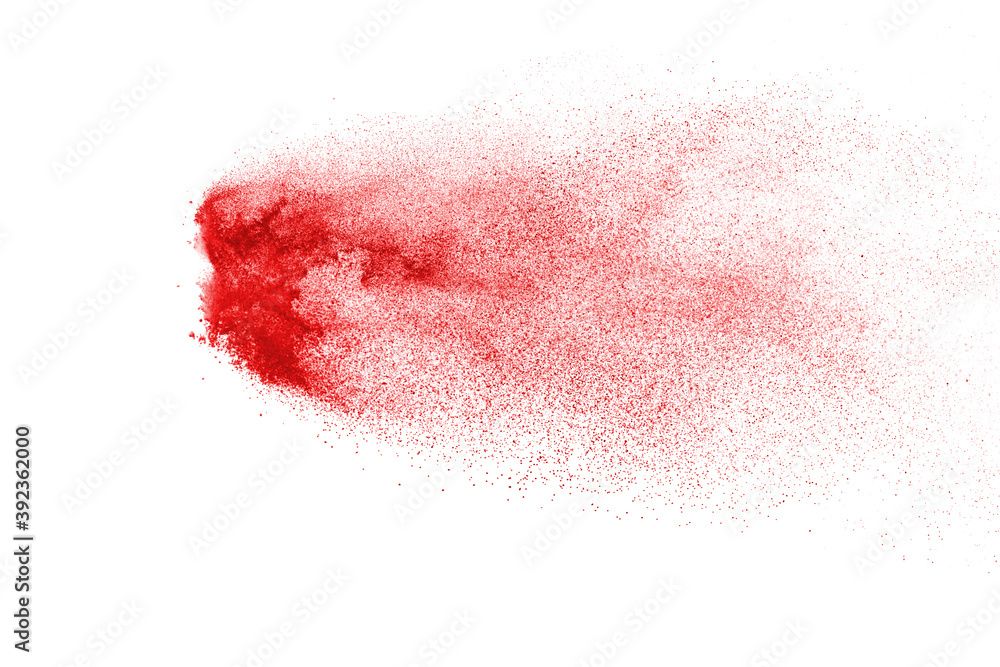 Red powder explosion isolated on white background.