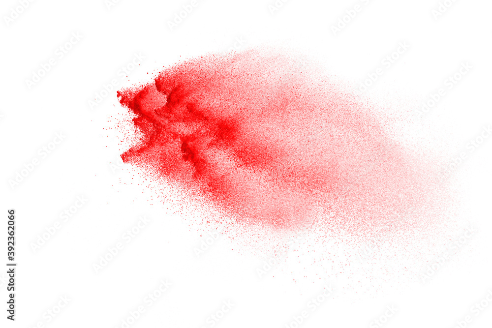 Red powder explosion isolated on white background.